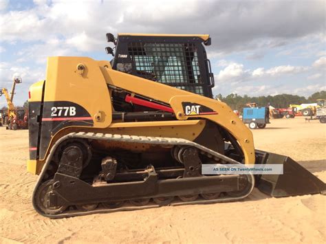 cat skid steer bucket release|caterpillar attachments for skid steer.